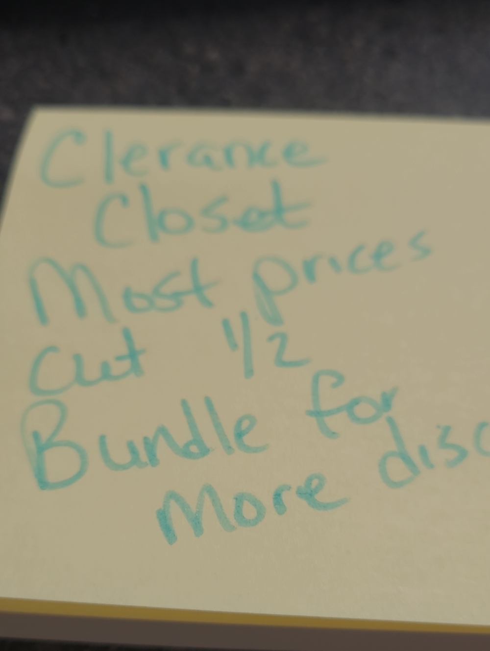 Handwritten Sticky Note in Turquoise Ink